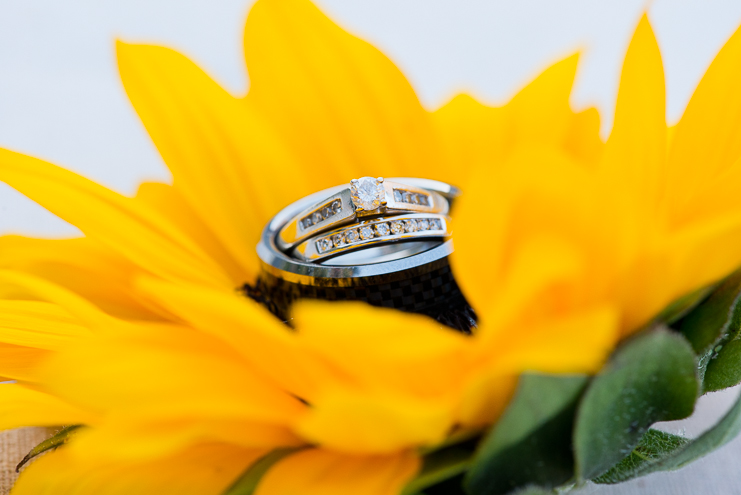 32 Limelife Photography sunflower ring shot wedding